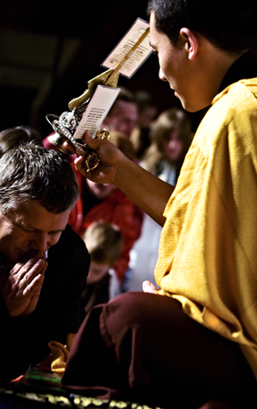 17th Karmapa giving blessings